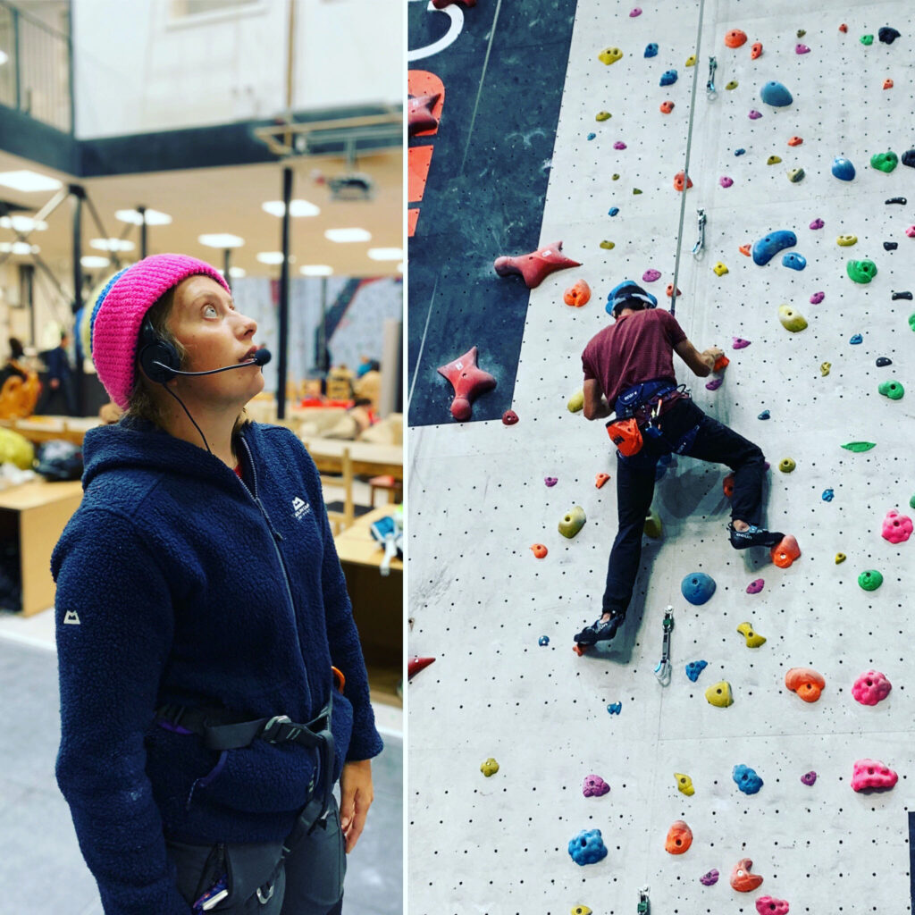 Lauren looks up wearing a bobble hat and microphone. John is half way up a wall peppered with climbing holds. 